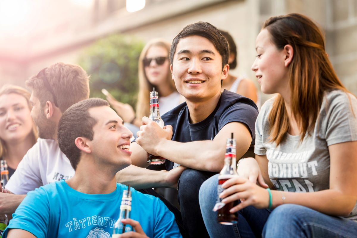 Students sitting on stairs and talking 