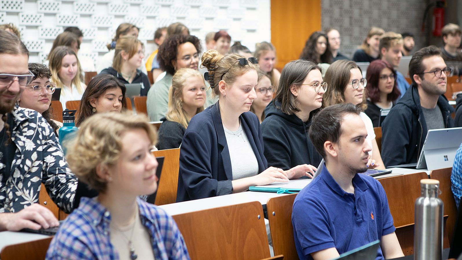 Students in the auditorium during a lecture.