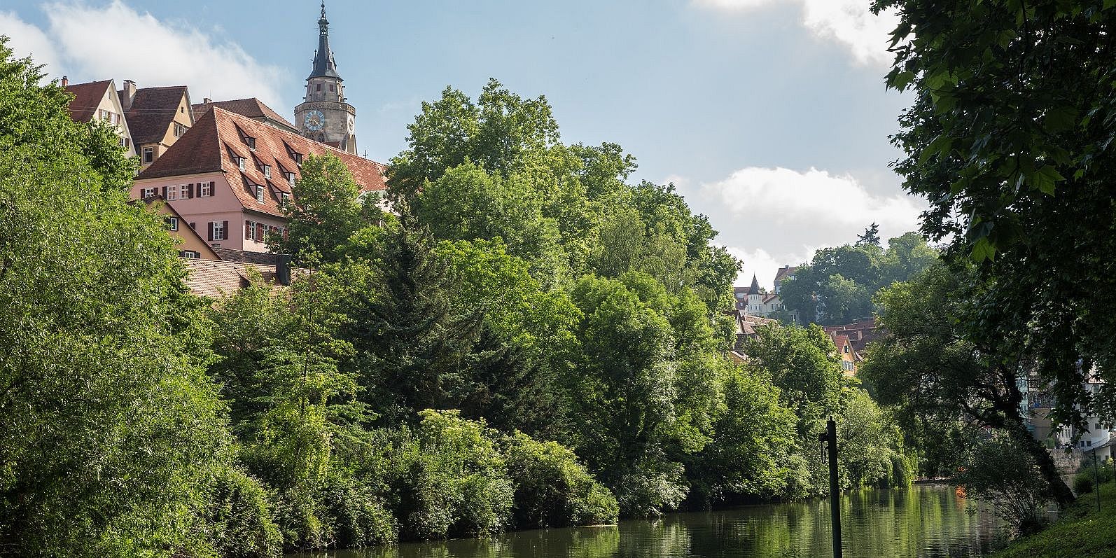 View to the Neckar river with the Stiftskirche church in the background