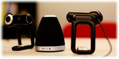 Figure 1. The recording sensors of the portable setup on the ELEA corpus. Two webcameras and the Microcone. Figure 1. The recording sensors of the portable setup on the ELEA corpus. Two webcameras and the Microcone.